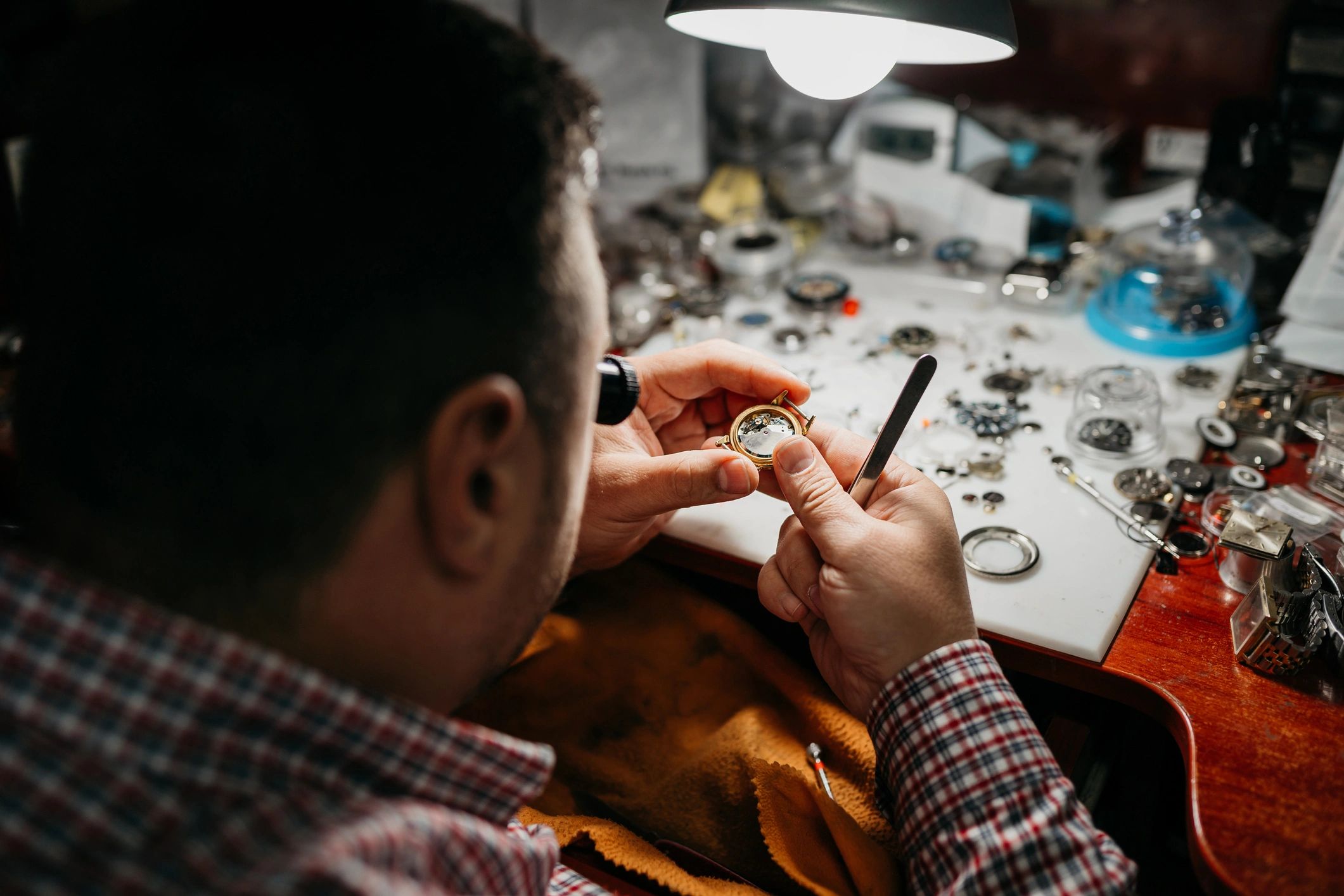 Watchmaker portrait in workshop
