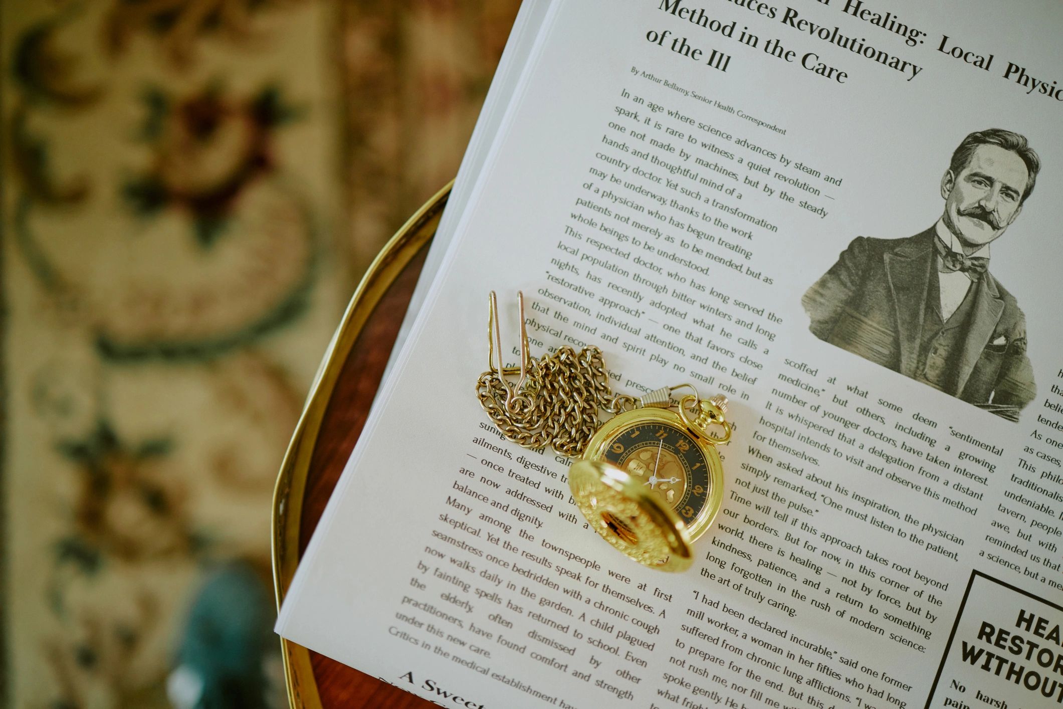 Vintage Gold Pocket Watch Resting on Open Magazine Featuring Historical Article