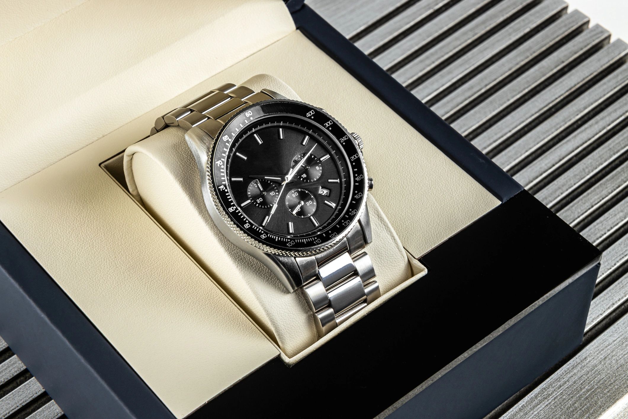 Luxury wristwatch photographed in a refined, minimal setting